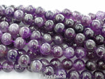 several strands of 10mm amethyst round beads
