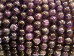 several strands of 10mm amethyst round beads