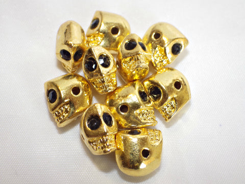 Rhodium plated skull beads in gold colour 