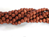 Goldstone round beads - 8mm